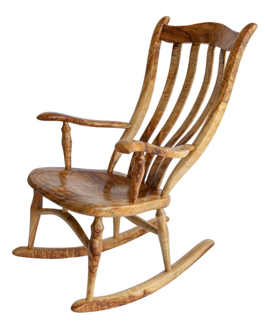 Detail view of rich timber grain on a handcrafted Camphor Laurel rocking chair by West End Rockers.