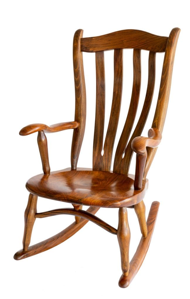 Handcrafted solid Walnut timber rocking chair with ergonomic support built by West End Rockers.